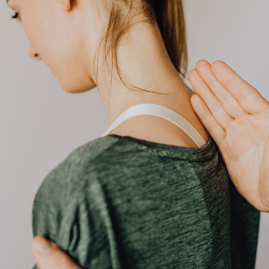 Chiropractor working on woman's back